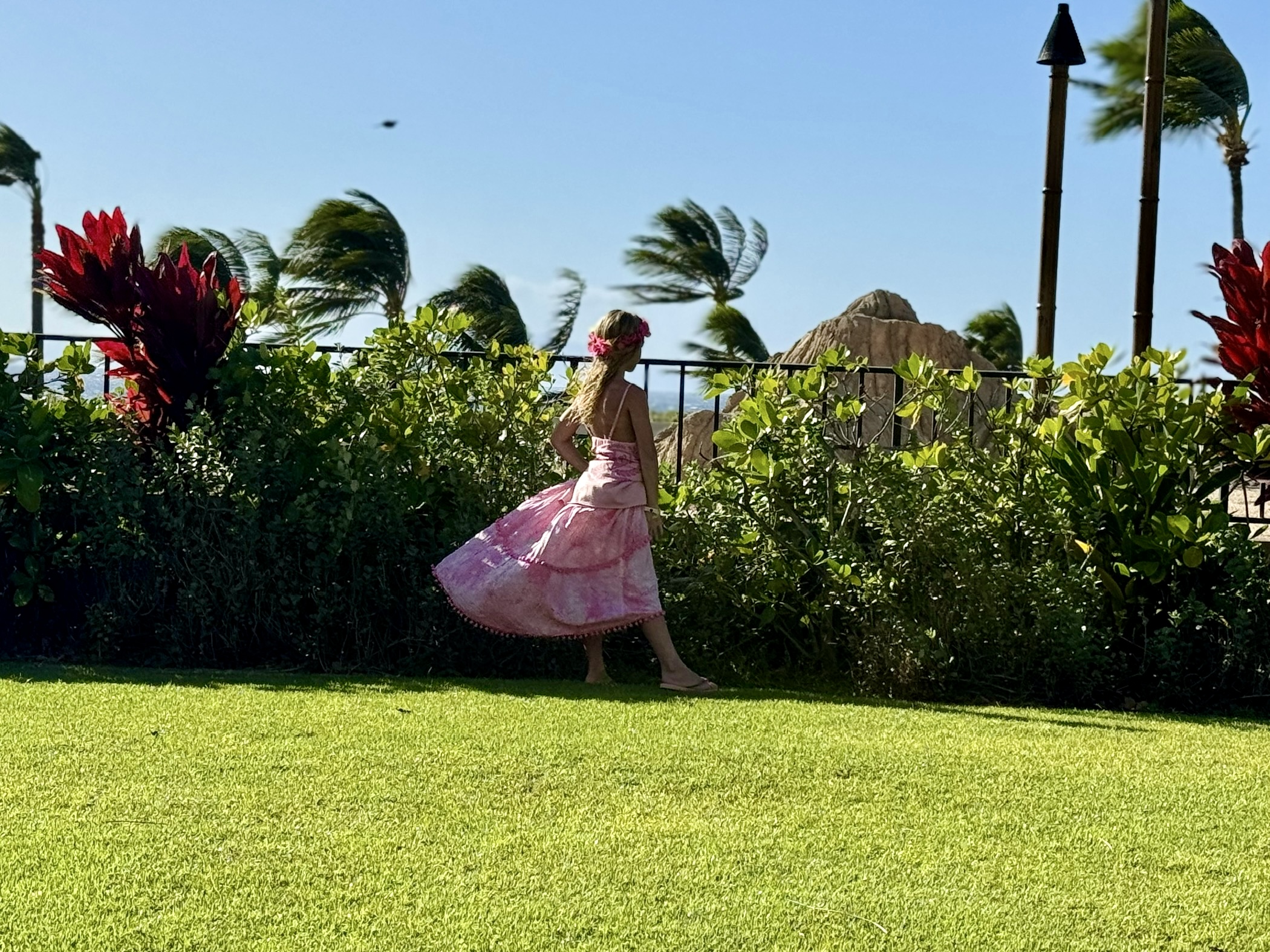 Maddie twirling in a pink dress